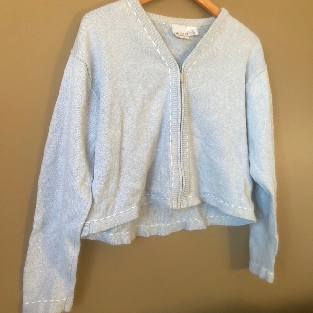Cropped length blue zip up cardigan